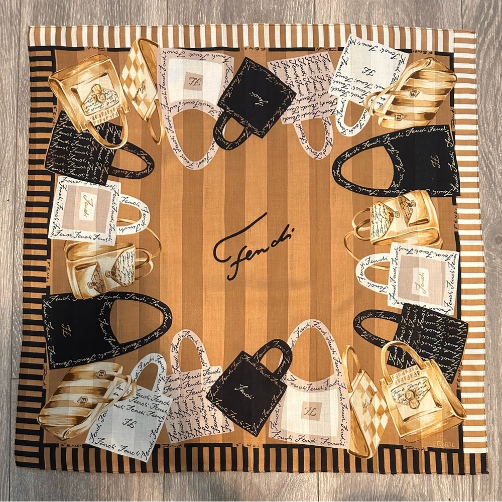 Fendi monogrammed scarf used 1x in Fendi showing.